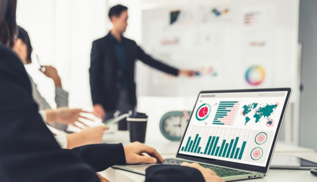 Team presenting business data to stakeholders in a meeting